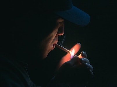 A man smoking a cigarette