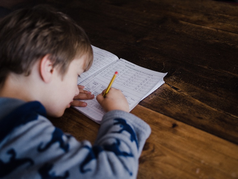 a child taking an assessment